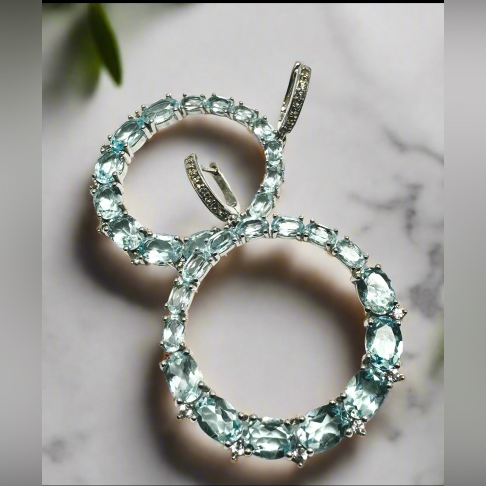 Woman’s Sterling Silver Swiss Blue Topaz Hoop Earrings with Omega Closure